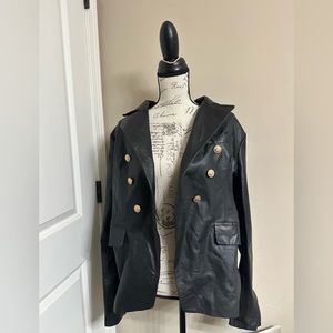 Women’s black leather jacket. Never worn. No tags. Size Medoum